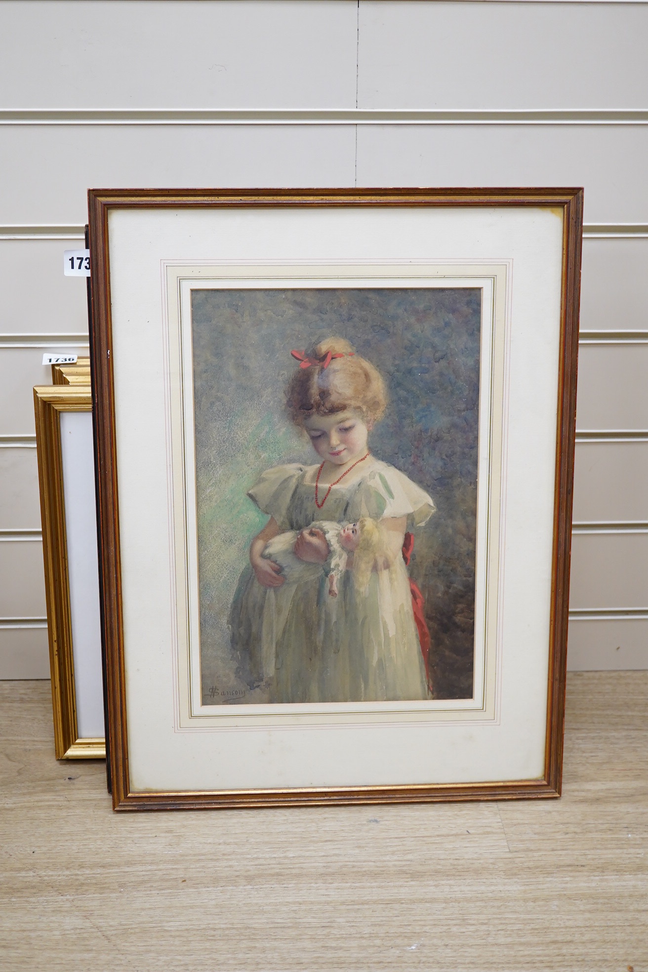 N Sanson, watercolour, Study of a young girl holding a doll, signed, 36 x 23cm. Condition - fair to good